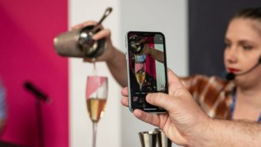 Woman making a cocktail